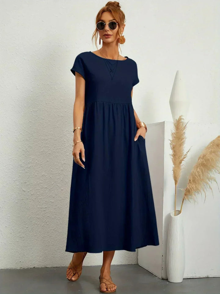 Chic flowy women's casual dress, perfect for versatile summer fashion.