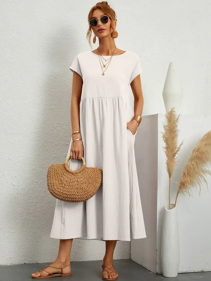 Comfortable elegant midi dress for women, effortless casual style.