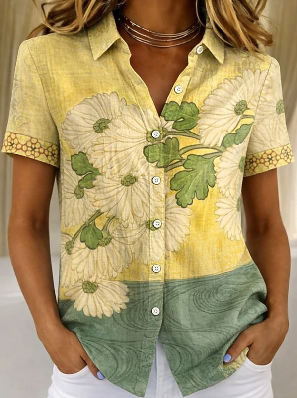 Spring/summer floral button-up blouse for women. Relaxed fit short-sleeve casual top.