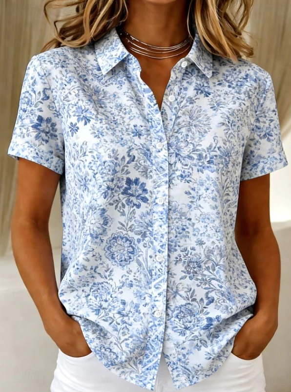Trendy floral button-up blouse, women's short-sleeve top for casual summer and spring fashion.