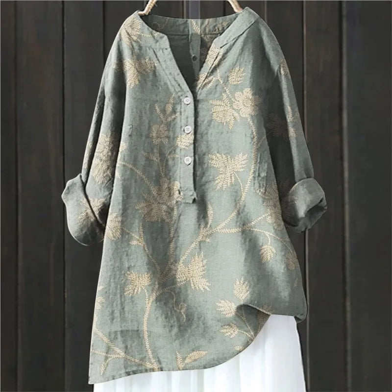 Elegant V-neck floral print blouse for women, comfortable & stylish for spring fashion.