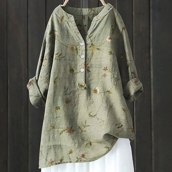 Vibrant floral print women's blouse, a casual and elegant top for spring & summer style.
