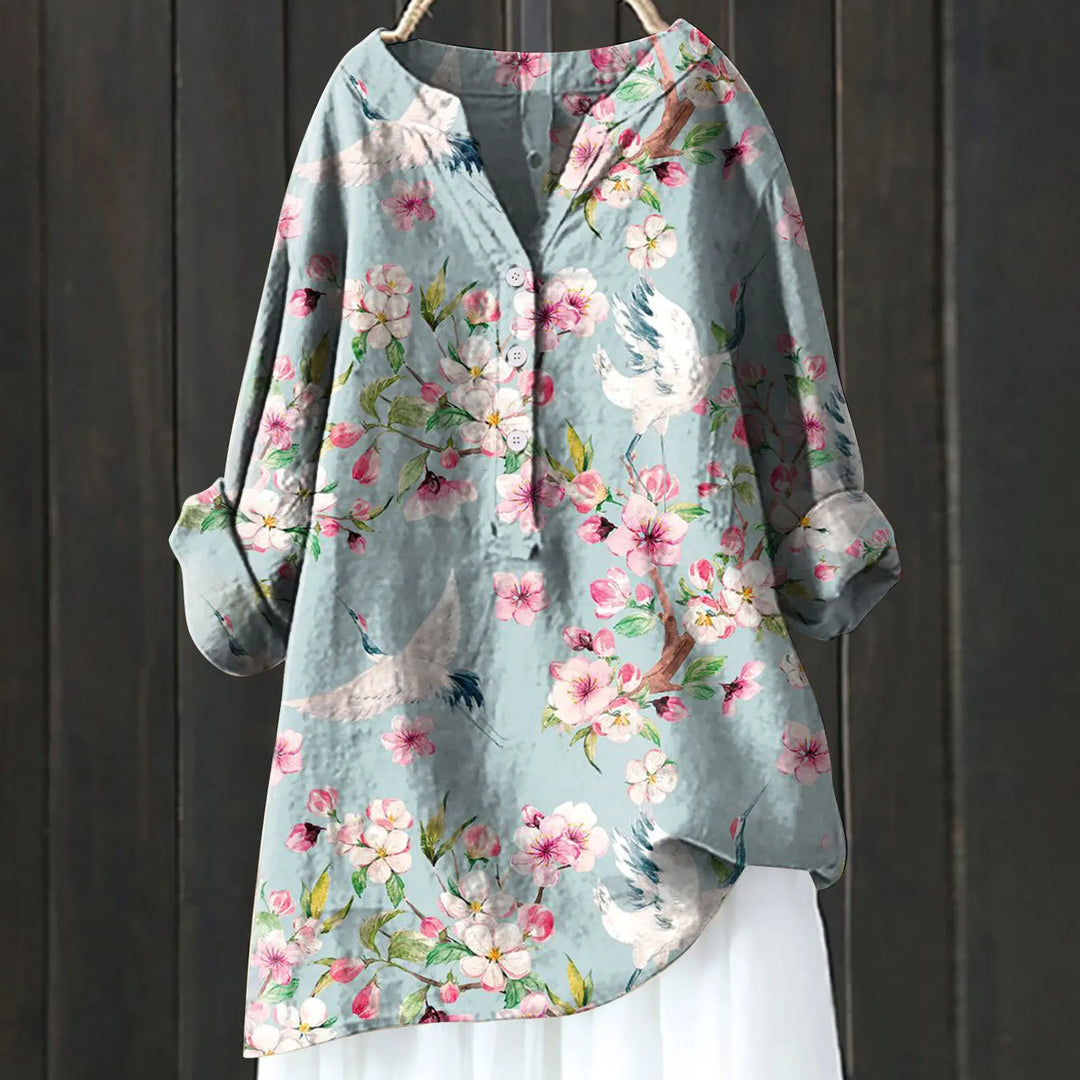 Spring/summer women's floral print blouse, a casual comfortable v-neck top for daily wear.