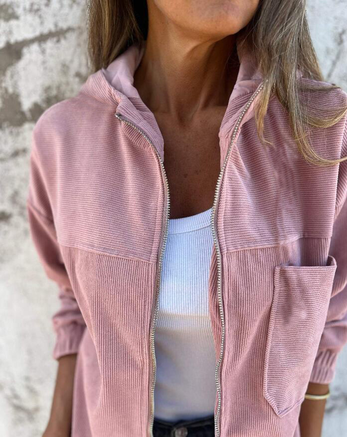 Full-zip women's casual jacket, hip-length design for comfortable everyday wear.