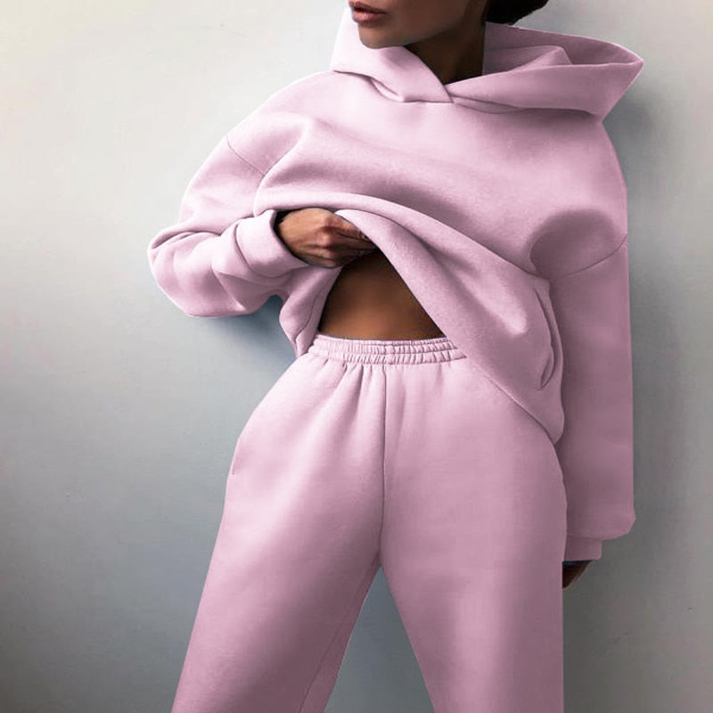 Relaxed fit women's hoodie & matching sweatpants set. Cozy two-piece casual loungewear for everyday comfort.