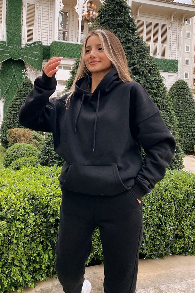 Ultra-soft women's hoodie and sweatpants set. Perfect casual loungewear for relaxing at home or running errands.