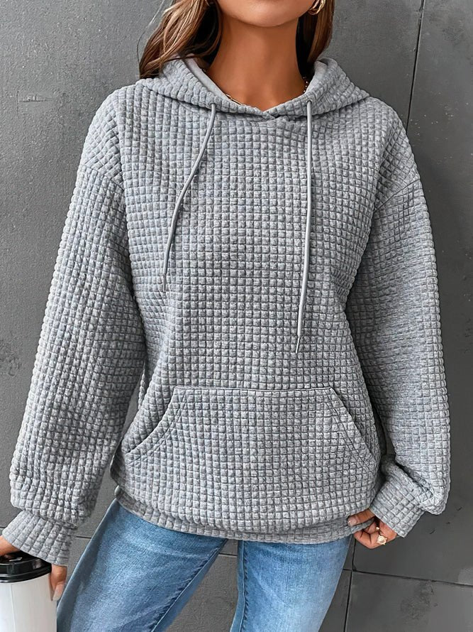 Cozy women's pullover hooded sweatshirt, ideal for spring casual style.