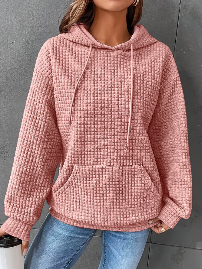 Soft women's long-sleeve hoodie, a comfortable and casual option for spring.