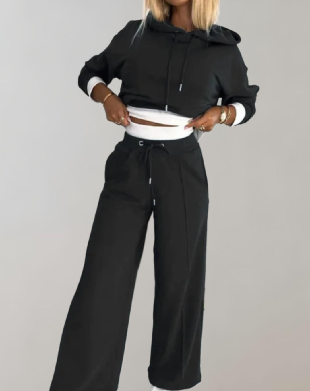 Women's casual hoodie tracksuit set for comfortable loungewear. Relaxed fit, stylish everyday outfit.