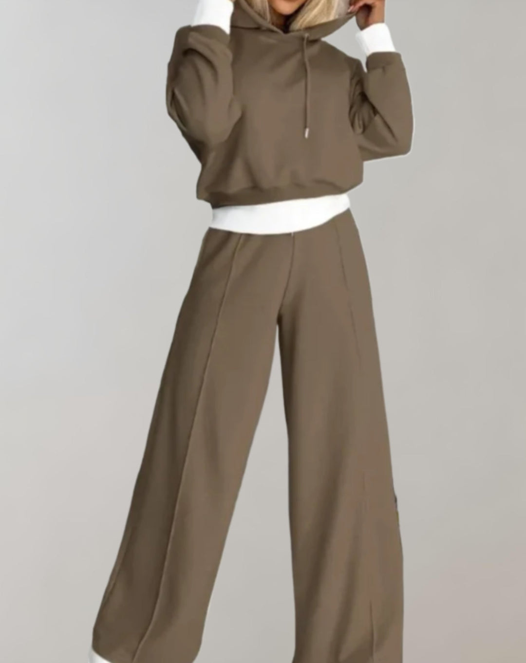 Comfortable women's tracksuit set with a relaxed hoodie. Ideal casual wear & matching outfit.