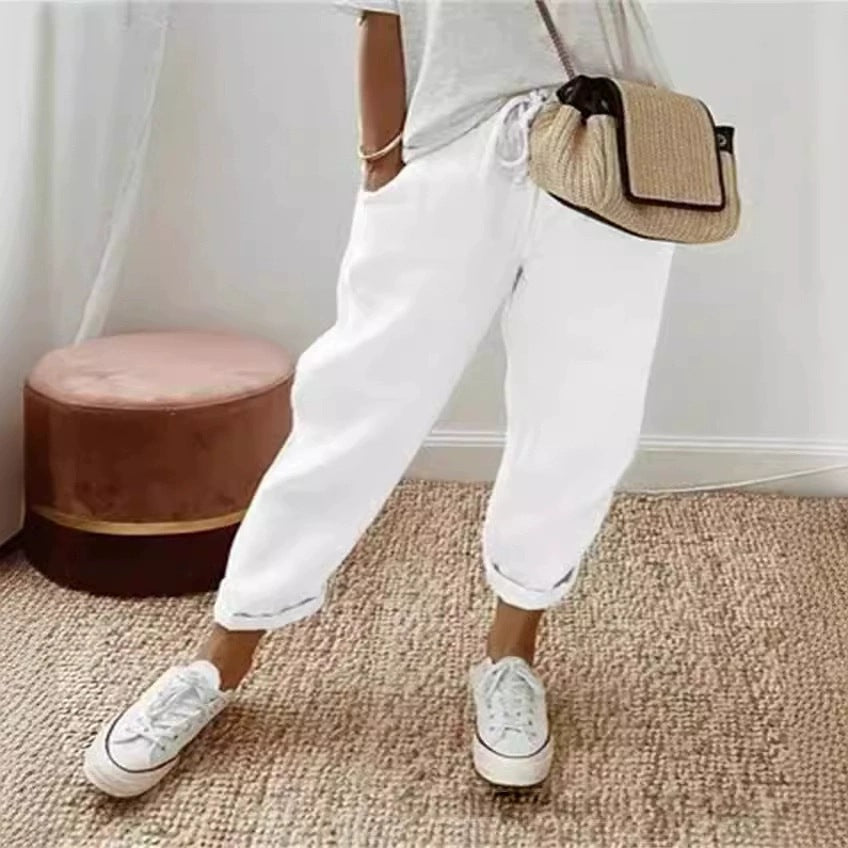 Chic women's elastic waist chino pants, a comfortable and versatile addition to casual outfits.