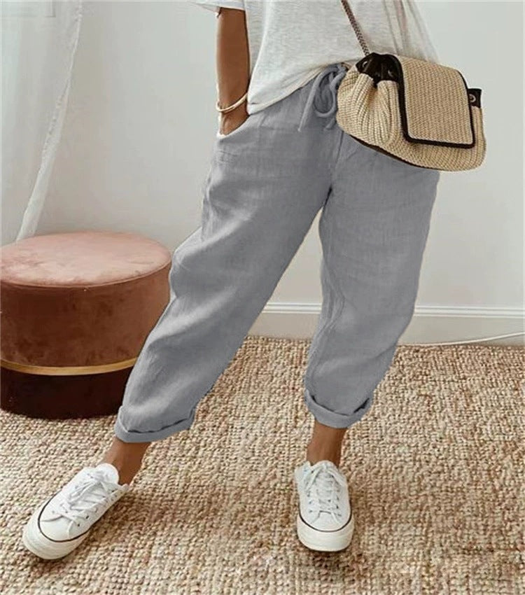 Fashionable women's black elastic waist chino pants, perfect for comfortable casual ensembles.