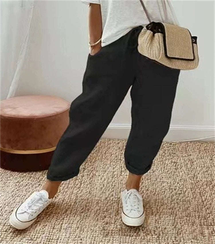 Relaxed fit women's black chino pants with elastic waist, versatile for daily fashion.