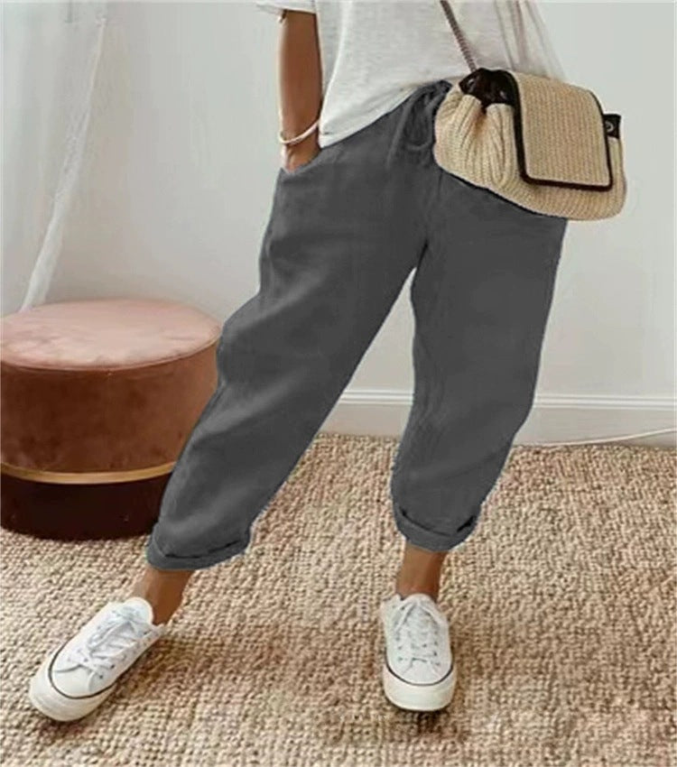 Comfortable women's grey chino pants, elastic waist, ideal for casual and everyday outfits.