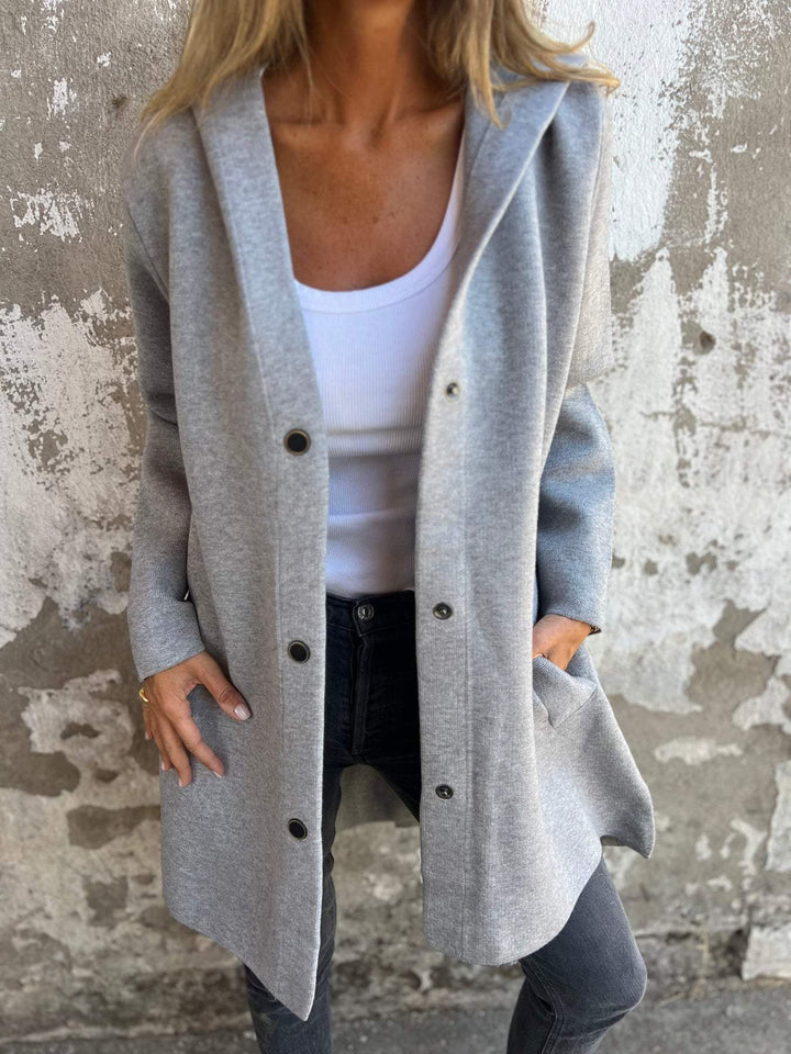 Beige women's knit hoodie jacket with elegant buttons, perfect for fall fashion and versatile casual layering.