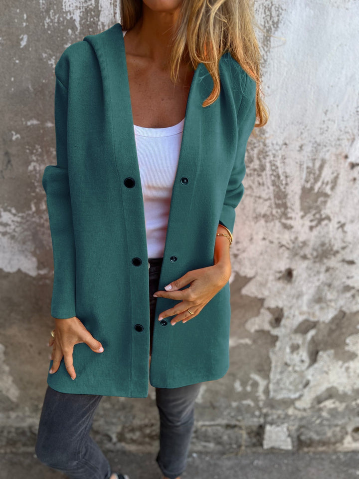 Women's fall fashion knit hoodie jacket with functional buttons, a versatile and warm addition to any wardrobe.