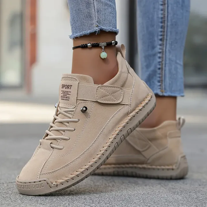 Women's casual lace-up walking sneakers in white, perfect for everyday comfort and versatile style.