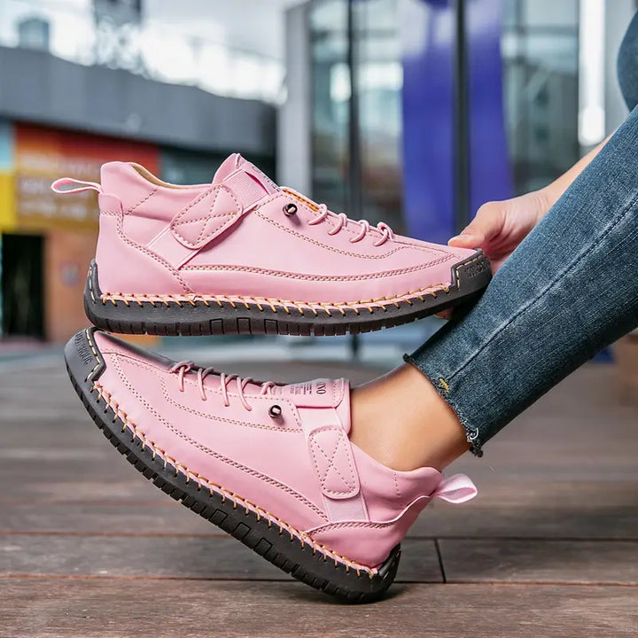 Top-down view of women's comfortable lace-up sneakers, great for walking and casual spring outfits.