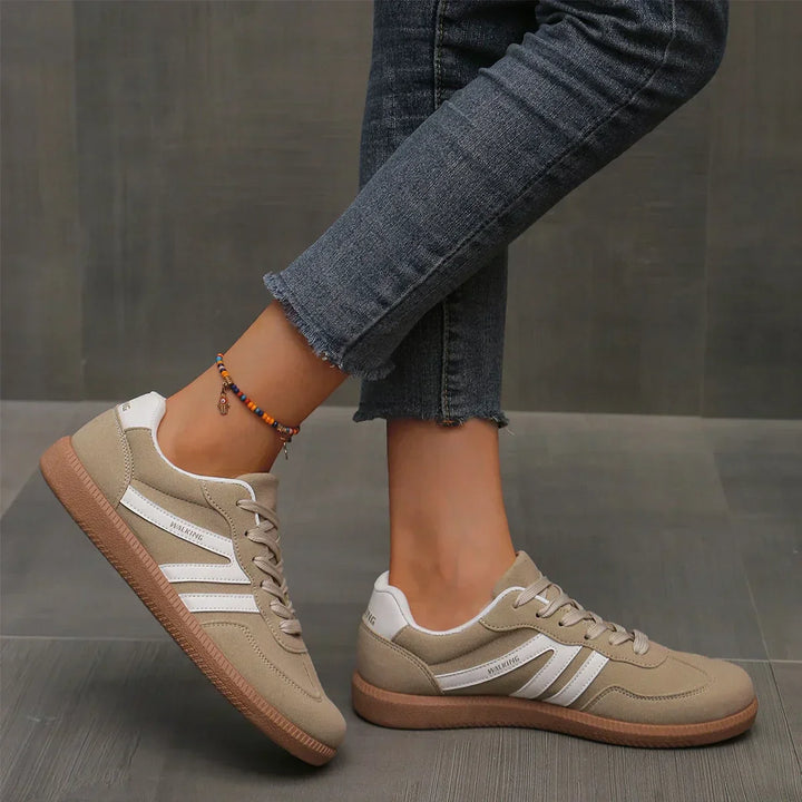 Fashionable women's walking shoes featuring an eye-catching leopard print and secure lace-up