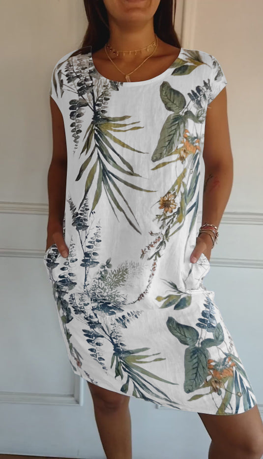 Women's casual leaf print short sleeve summer dress, perfect for vacation or everyday fashion.