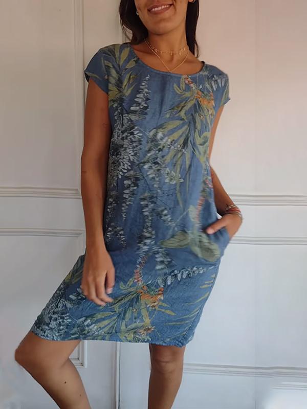 Relaxed fit short sleeve summer dress for women, decorated with a chic leaf print, vacation style.