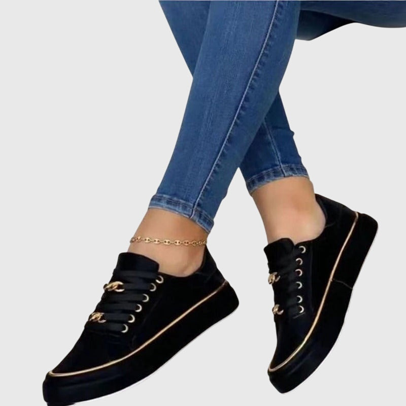 Pair of women's comfortable velvet lace-up sneakers in a vibrant color, ideal for spring fashion and daily wear.