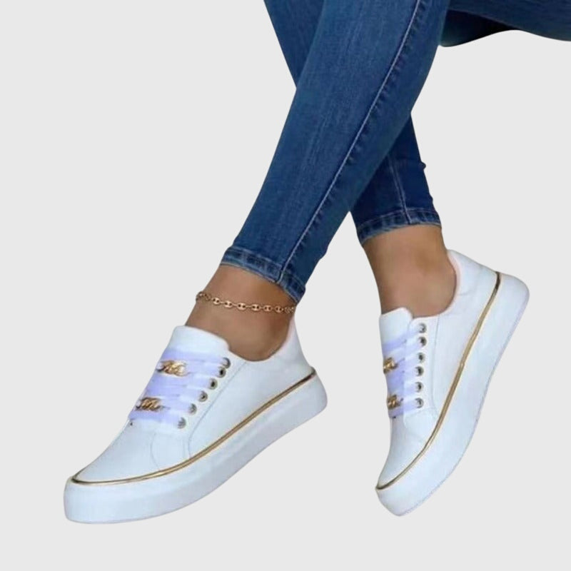 Side view of women's casual velvet lace-up sneakers, showcasing the low-top design and durable sole.