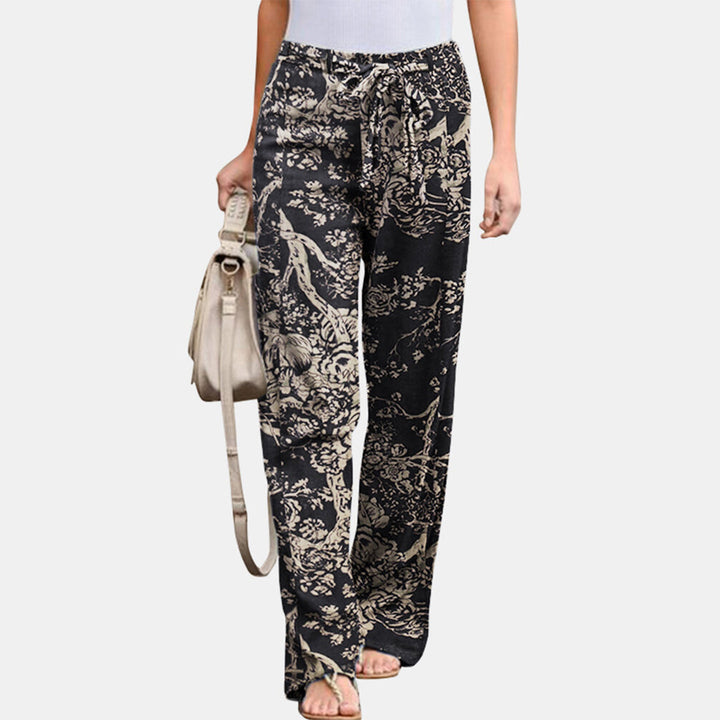 Women's versatile mid-waist trousers, relaxed fit, ideal for casual outfits & everyday comfort.