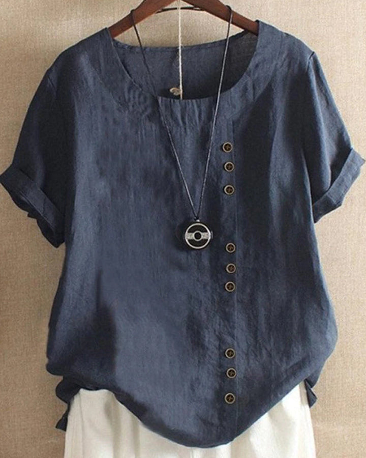 Front view of a women's casual short sleeve button detail blouse, ideal for summer fashion