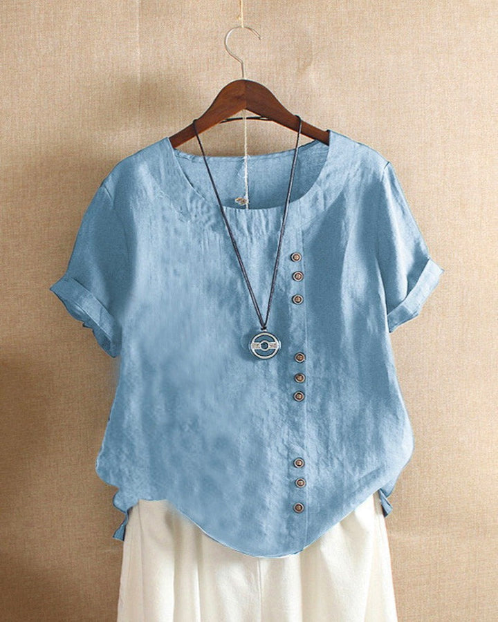 Back view of a comfortable women's casual short sleeve blouse, great for everyday wear