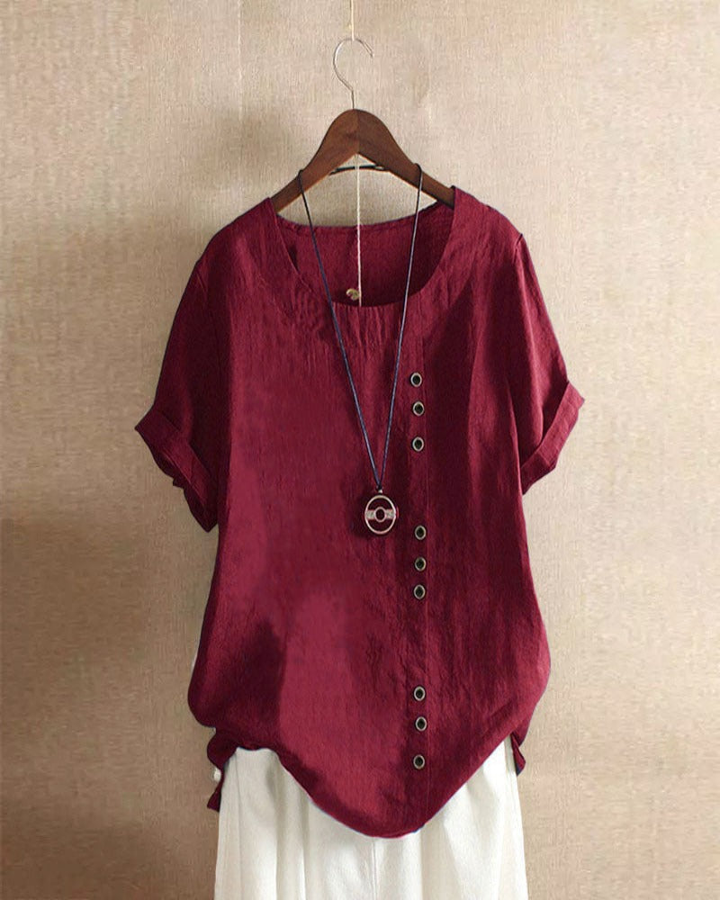 Stylish women's casual short sleeve blouse featuring intricate button detailing for summer outfits