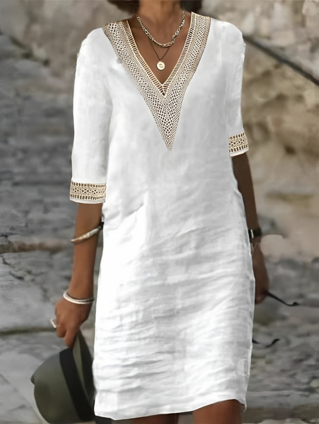 Women's casual short-sleeve dress, comfortable for everyday wear. Versatile summer fashion.