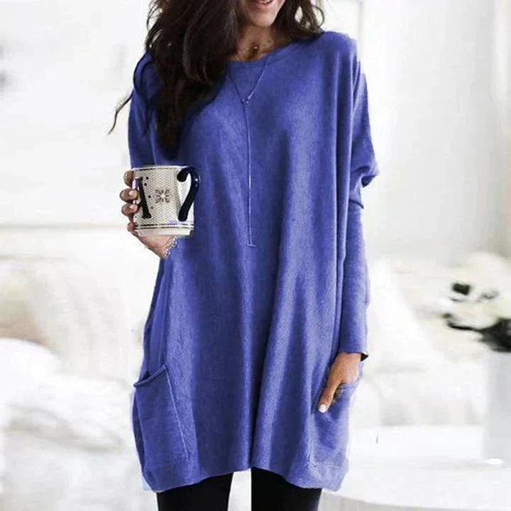 Relaxed fit women's pocket tee for versatile casual wear. Soft feel, short sleeve everyday top.