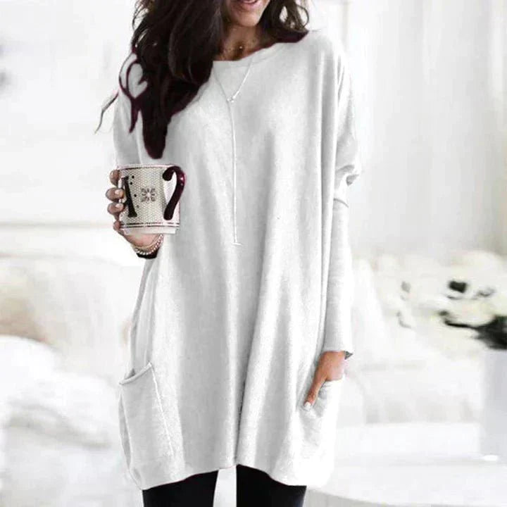 Soft feel women's casual t-shirt with front pocket, offering everyday comfort in a relaxed fit.