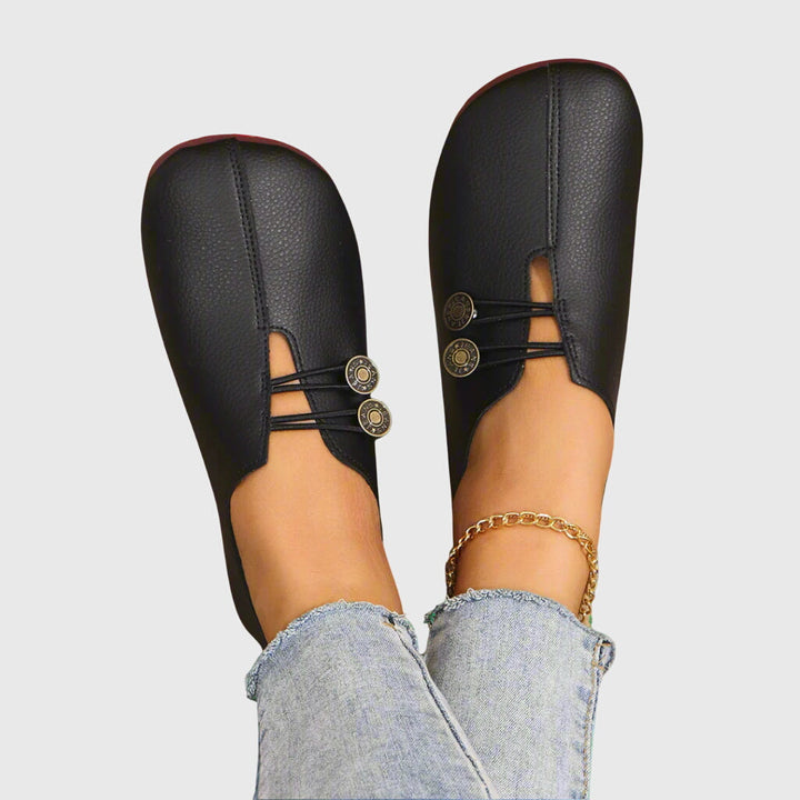 Casual women's slip-on shoes with a unique button element, offering spring and summer comfort
