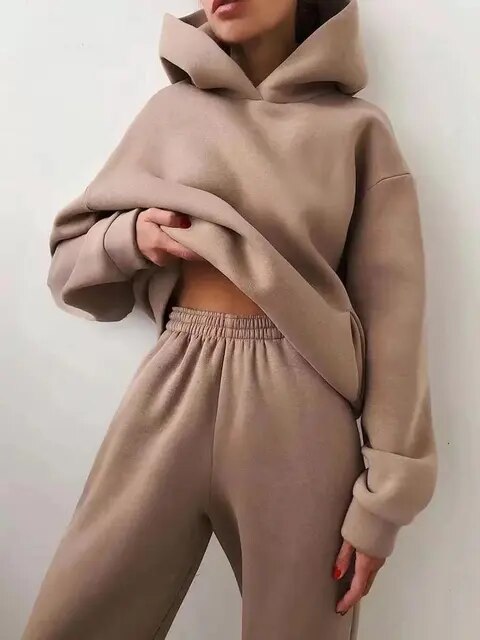 Side view of women's casual spring loungewear set, two-piece in cream, relaxed and chic.