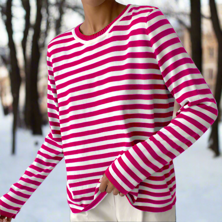 Detailed shot of the striped pattern on a women's long sleeve casual top.