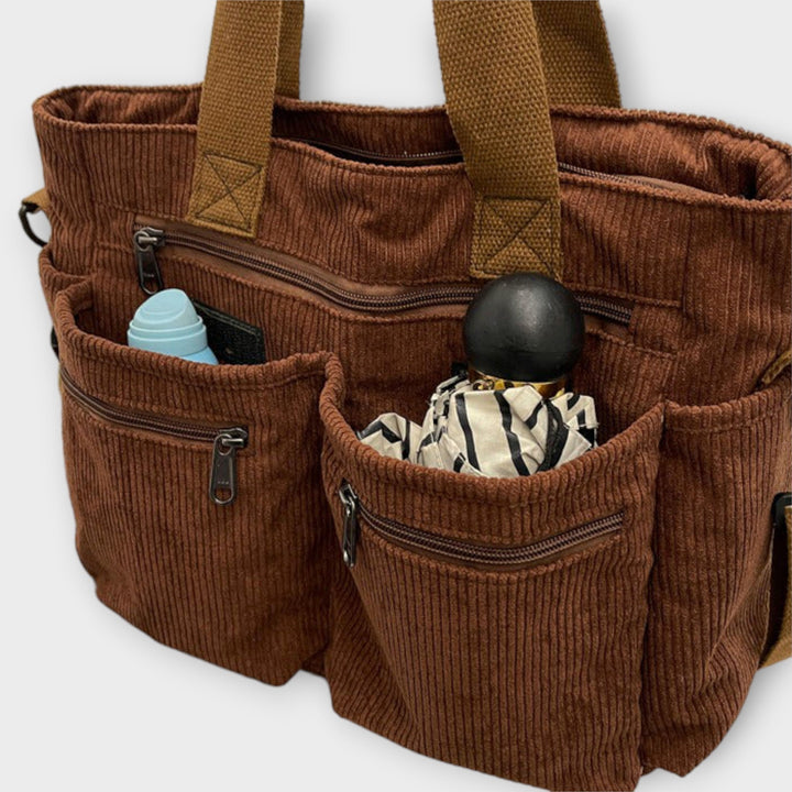 Everyday casual handbag for women, spacious tote design.