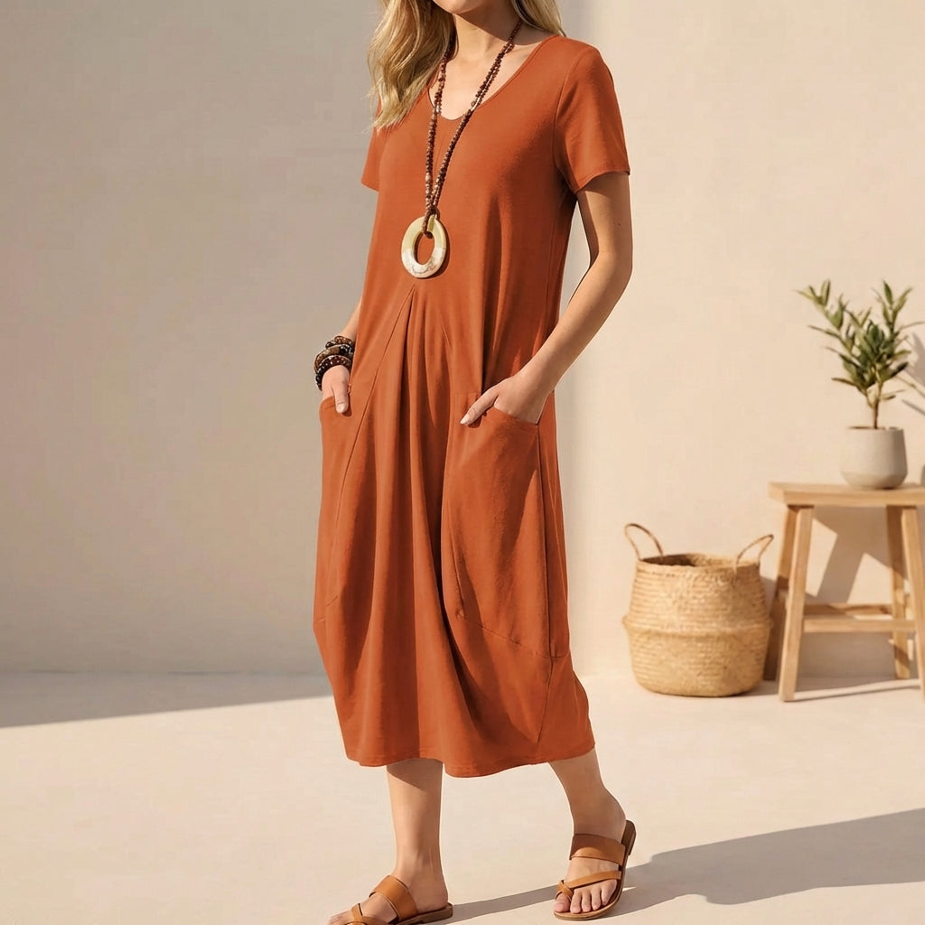 Everyday women's casual midi dress with V-neck, short sleeves, and convenient pockets for ultimate comfort & style.