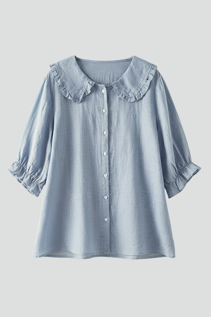 Women's casual white button-front shirt with ruffled collar, perfect for everyday wear.
