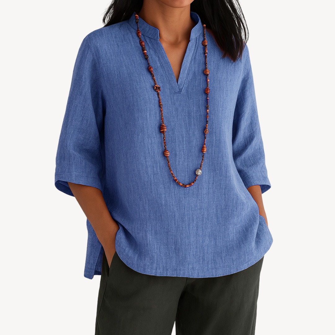 Women's casual white linen tunic top with relaxed fit, perfect for summer everyday wear or beachwear.