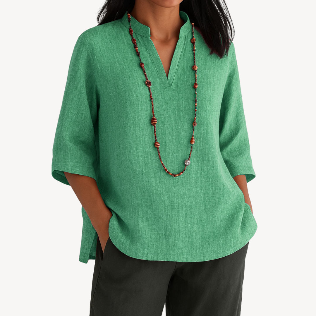 Close-up of a women's relaxed fit linen tunic top, showcasing the fabric texture and casual style.
