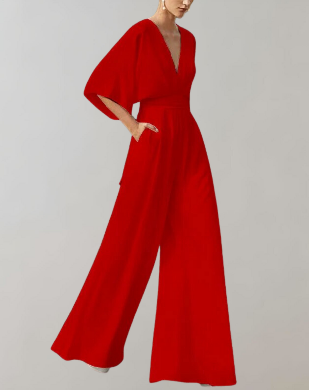 Woman confidently wearing a versatile wide leg overall jumpsuit. Ideal for casual summer outings.