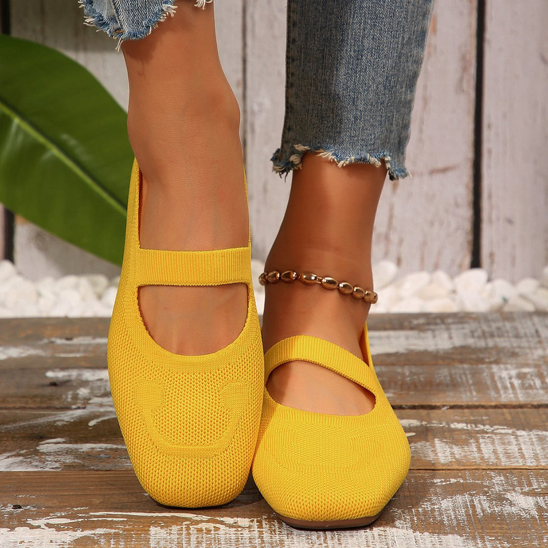 Everyday cheerful women's flats, featuring a Mary Jane design and smiling face for comfortable casual style.