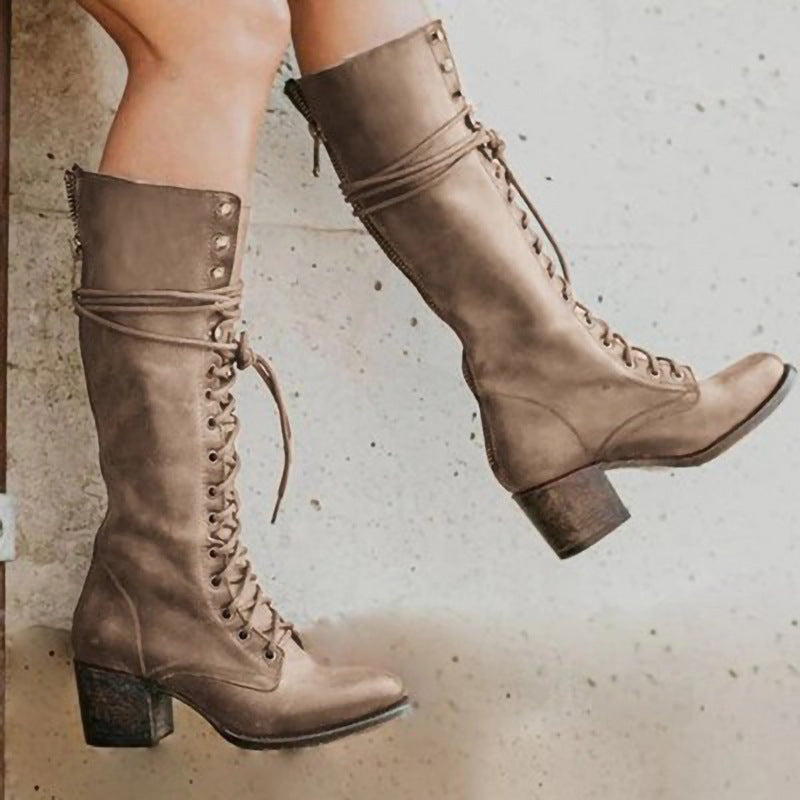 Black leather lace-up knee boots for women, a sophisticated and versatile footwear choice.