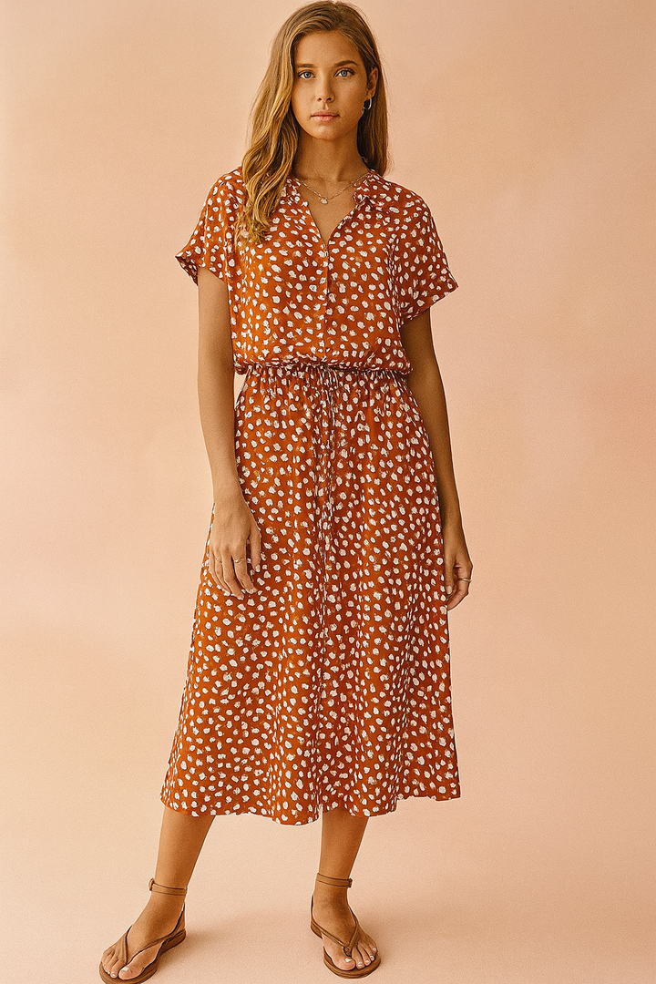 Comfortable women's flowy midi summer dress. Polka dot boho style, great for casual elegance or beach vacations.
