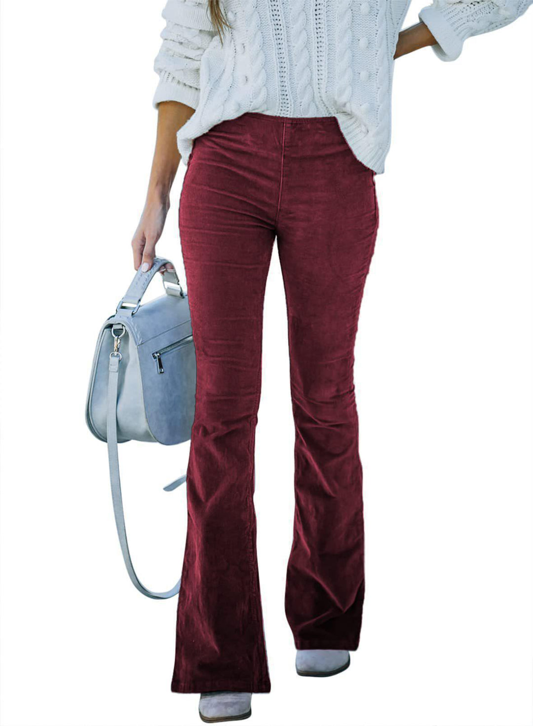 Stylish women's high waist flared pants, modern bell bottom design for a chic appearance.