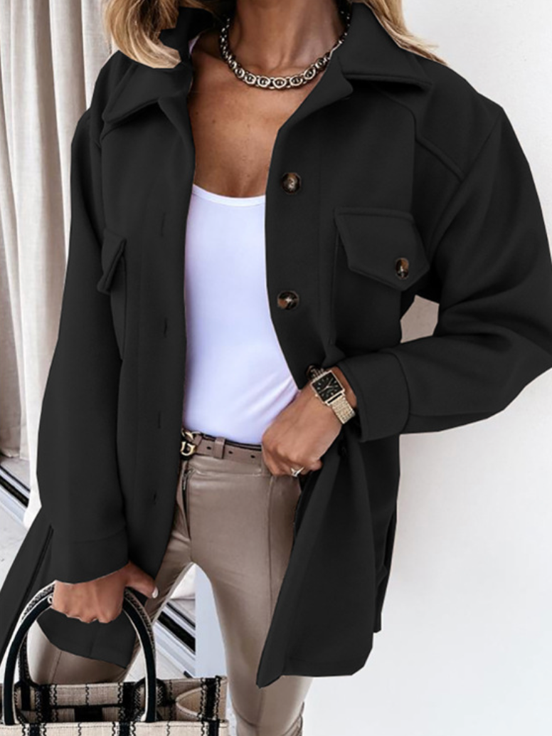 Casual women's spring outerwear: an oversized shacket with a relaxed fit and functional pockets