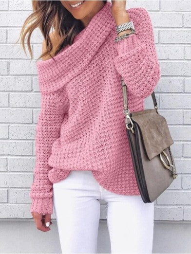 Casual women's oversized off-shoulder sweater. Versatile long-sleeve knit for comfortable fall fashion looks.