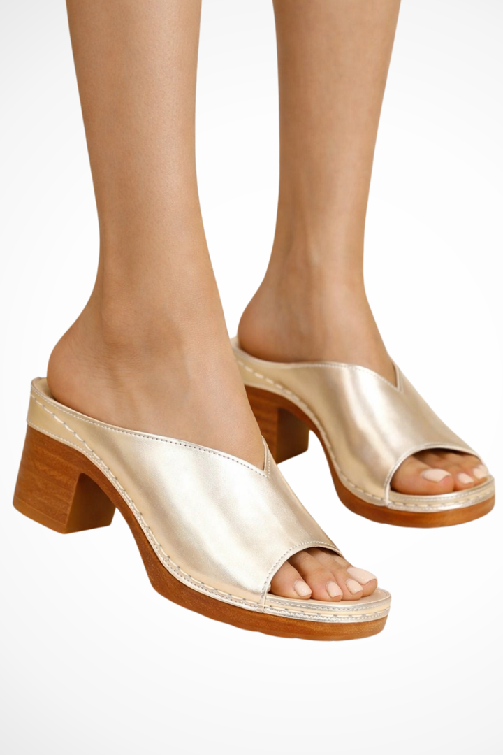 Sophisticated open-toe block heel mules for women, a comfortable and stylish slip-on design.